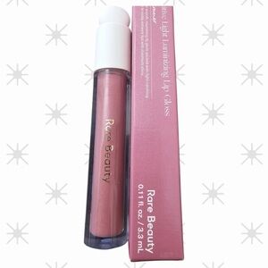 RARE BEAUTY POSITIVE LIGHT LUMINIZING LIP GLOSS GLIMMER PINK.